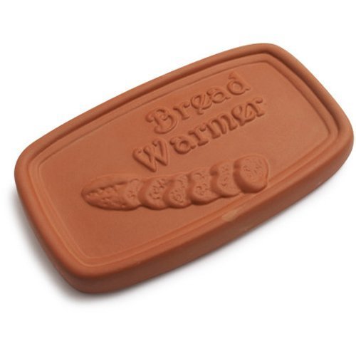 Handcrafted terra cotta bread warmer designed to keep bread, buns, and tortillas warm, perfect for dining or festive gatherings. 