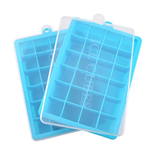 Two sky blue silicone ice cube trays with detachable lids, filled with perfectly shaped ice cubes, against a white background.