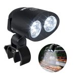 A close-up of the RVZHI BBQ Grill Light attached to a barbecue handle, illuminating the grill surface with its 10 super bright LED lights.