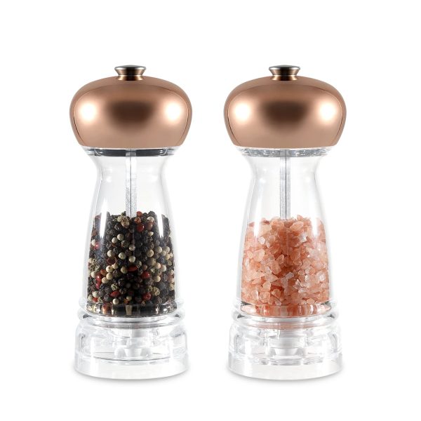 Rose gold salt and pepper grinder set with adjustable coarseness, displayed on a kitchen countertop.