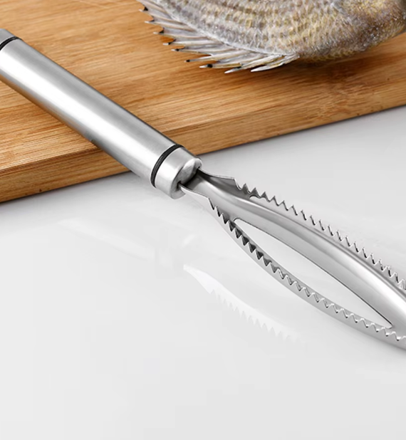 Stainless steel poultry lung remover set, featuring an ergonomic design for efficient meat processing. 