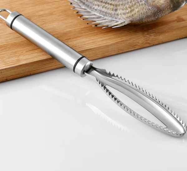 Stainless steel poultry lung remover set, featuring an ergonomic design for efficient meat processing. 